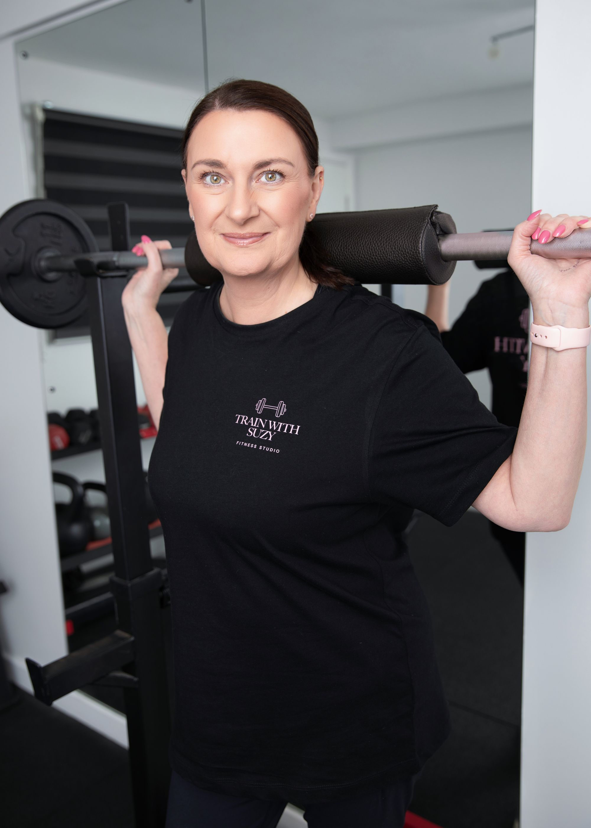 Suzy in the squat rack at her private Sheffield gym